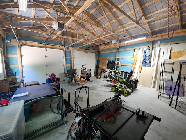 11339 Alpine Dr, Lake, MI 48632 - garage featuring a garage door opener