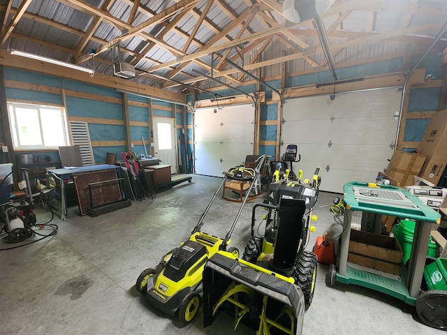 11339 Alpine Dr, Lake, MI 48632 - garage featuring a garage door opener