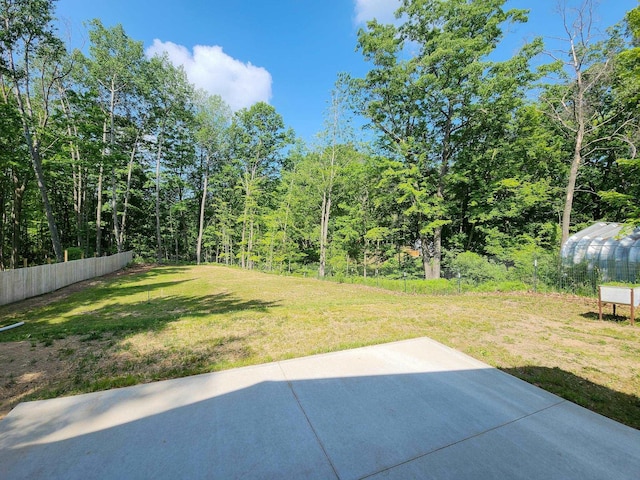 11339 Alpine Dr, Lake, MI 48632 - view of yard with a patio area and an exterior structure