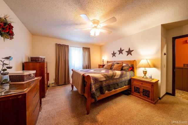 326 County Road Mp Rd, Negaunee, MI 49866 - bedroom with light carpet, a ceiling fan, a textured ceiling, and baseboard heating