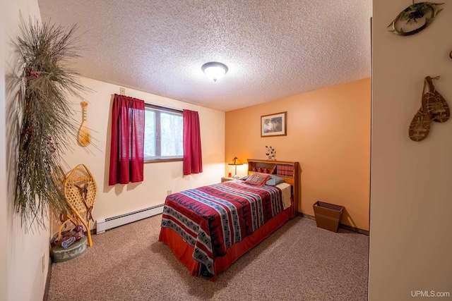 326 County Road Mp Rd, Negaunee, MI 49866 - carpeted bedroom featuring a baseboard heating unit and a textured ceiling