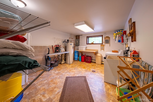 326 County Road Mp Rd, Negaunee, MI 49866 - below grade area featuring electric water heater, separate washer and dryer, and electric panel