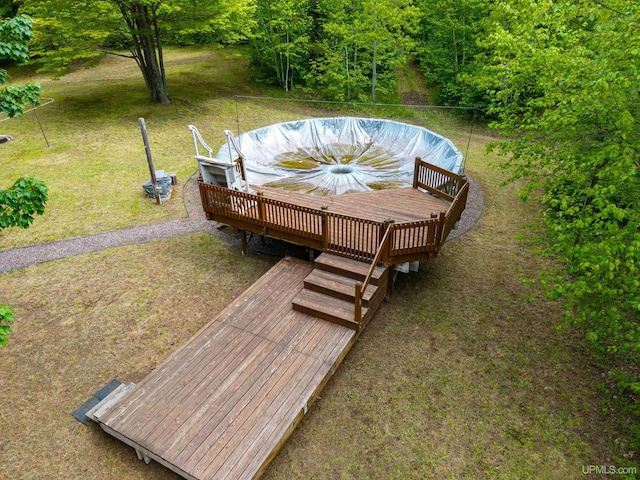 326 County Road Mp Rd, Negaunee, MI 49866 - view of property's community with a wooden deck and a lawn
