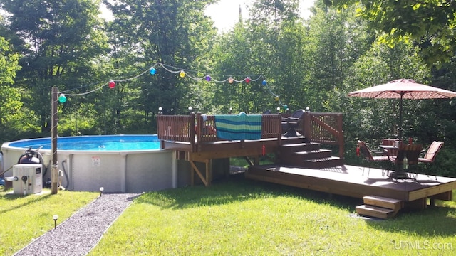 326 County Road Mp Rd, Negaunee, MI 49866 - outdoor pool with a wooden deck and a yard