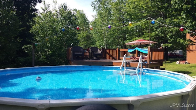 326 County Road Mp Rd, Negaunee, MI 49866 - swimming pool featuring a deck