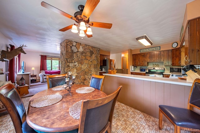 326 County Road Mp Rd, Negaunee, MI 49866 - dining area with ceiling fan