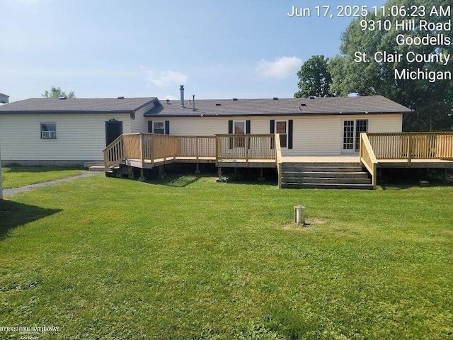 9310 Hill Rd, Wales, MI 48027 - back of house with a wooden deck and a lawn