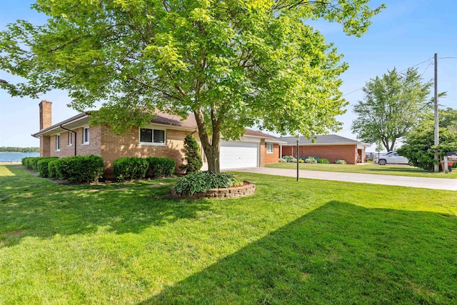 104 Marell St, East China, MI 48054 - single story home with a chimney, driveway, brick siding, and a front lawn