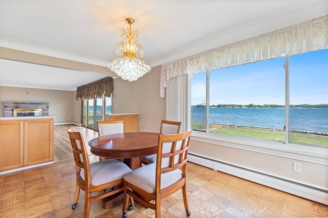 104 Marell St, East China, MI 48054 - dining area with baseboard heating, plenty of natural light, a chandelier, and a baseboard heating unit