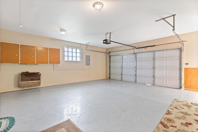 104 Marell St, East China, MI 48054 - garage featuring electric panel, heating unit, and a garage door opener