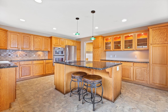 104 Marell St, East China, MI 48054 - kitchen featuring stainless steel appliances, a kitchen island, glass insert cabinets, a breakfast bar, and dark stone counters