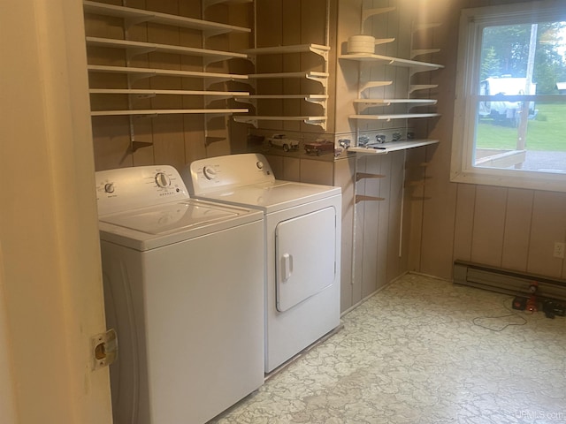 26121 S Calumet St, Laurium, MI 49913 - washroom featuring independent washer and dryer, light floors, and a baseboard heating unit
