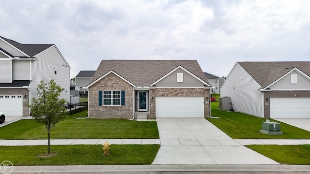 58530 Westmoore Cir, New Haven, MI 48048 - view of front facade with brick siding, concrete driveway, and a shingled roof