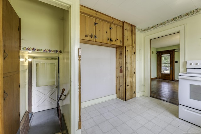 6410 Sheridan Line Rd, Croswell, MI 48422 - kitchen featuring electric stove, brown cabinets, and light countertops