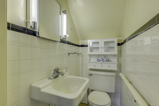 6410 Sheridan Line Rd, Croswell, MI 48422 - bathroom with tile walls and lofted ceiling