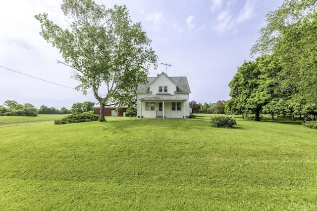 6410 Sheridan Line Rd, Croswell, MI 48422 - view of front of house featuring a front lawn and roof with shingles