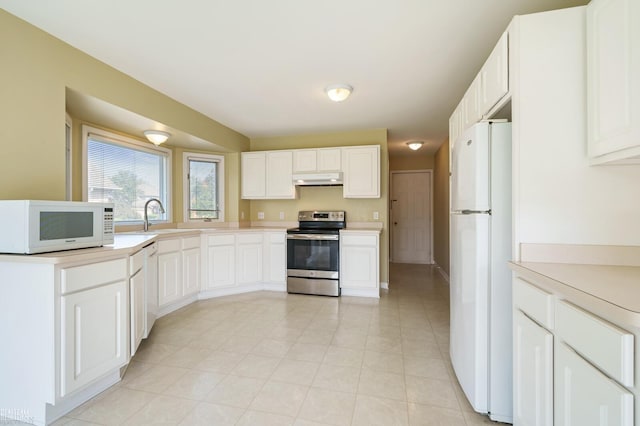 14060 Wayford Run, Shelby Twp, MI 48315 - kitchen with white appliances, light countertops, under cabinet range hood, and white cabinets