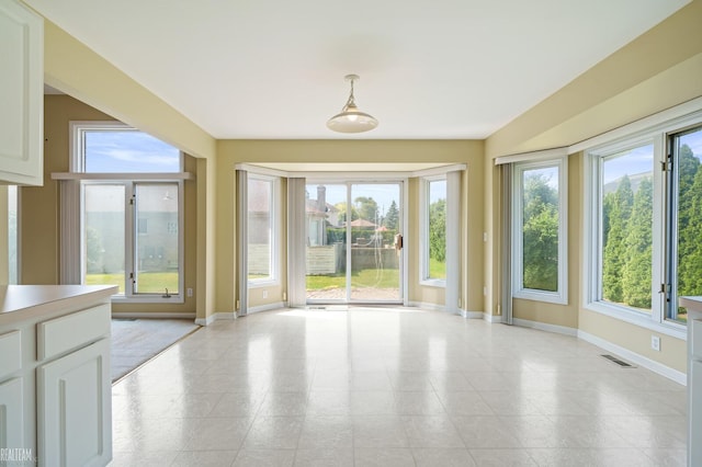 14060 Wayford Run, Shelby Twp, MI 48315 - unfurnished dining area with baseboards