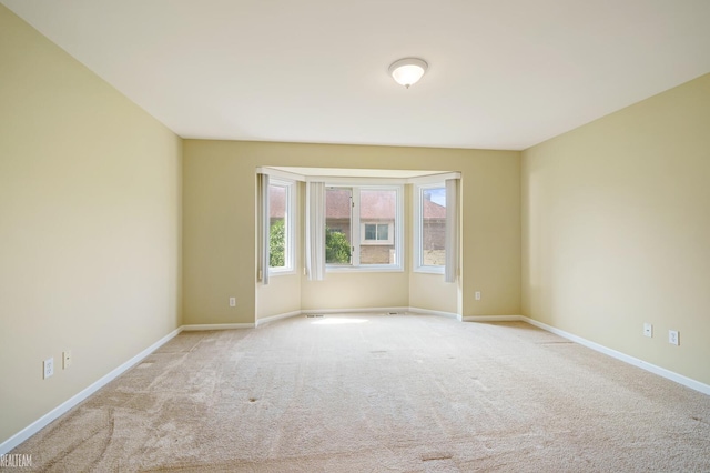 14060 Wayford Run, Shelby Twp, MI 48315 - spare room with carpet flooring and baseboards