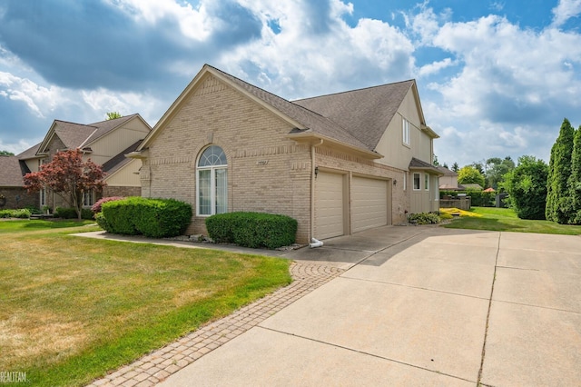 14060 Wayford Run, Shelby Twp, MI 48315 - view of front of house with brick siding, concrete driveway, a front lawn, roof with shingles, and an attached garage