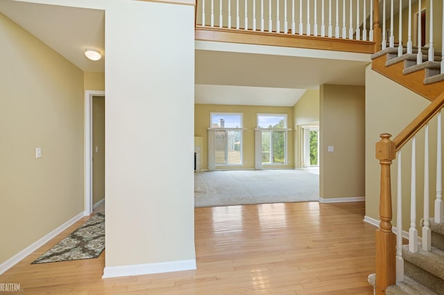 14060 Wayford Run, Shelby Twp, MI 48315 - entryway featuring stairs and hardwood / wood-style flooring