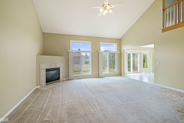 14060 Wayford Run, Shelby Twp, MI 48315 - unfurnished living room featuring high vaulted ceiling, a ceiling fan, carpet flooring, and a premium fireplace