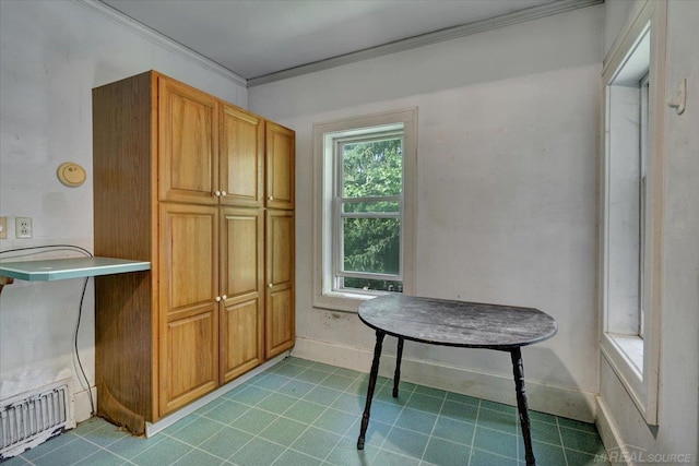 79050 Capac Rd, Armada, MI 48005 - kitchen with crown molding and brown cabinets