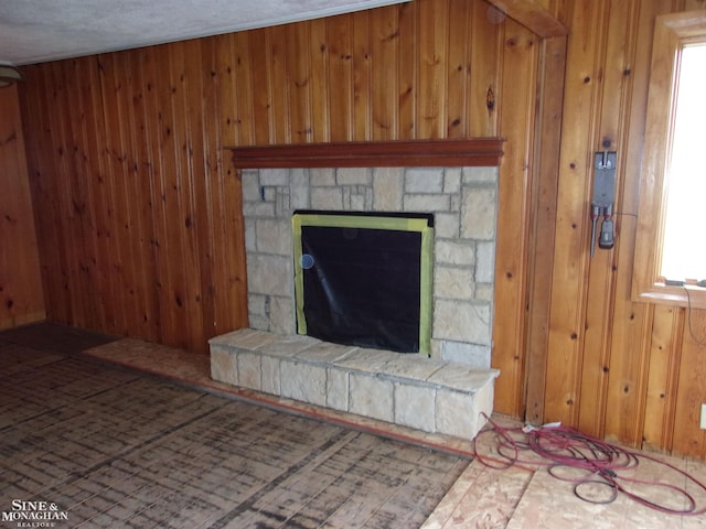 2221 N Channel Dr, Harsens Island, MI 48028 - detailed view of wooden walls and a stone fireplace