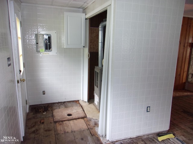 2221 N Channel Dr, Harsens Island, MI 48028 - hall featuring tile walls, hardwood / wood-style flooring, and electric panel