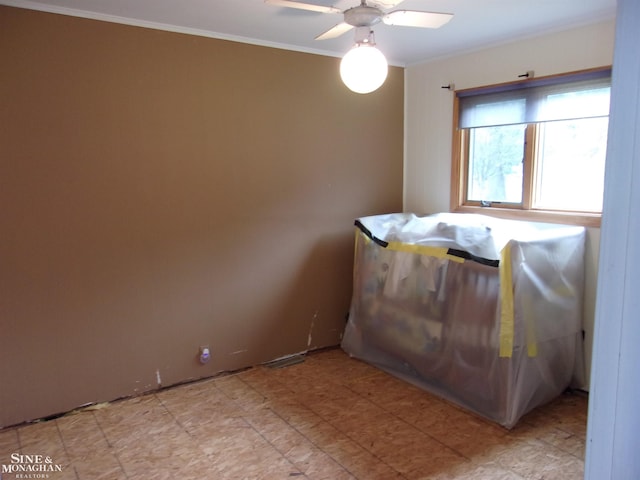 2221 N Channel Dr, Harsens Island, MI 48028 - bedroom with crown molding and ceiling fan