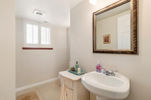 3667 Alderdale Dr, Sterling Heights, MI 48310 - bathroom with a sink and tile patterned floors