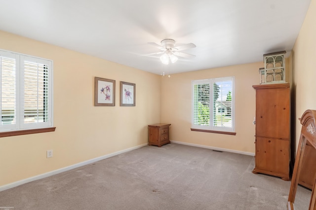 3667 Alderdale Dr, Sterling Heights, MI 48310 - unfurnished bedroom featuring carpet floors and a ceiling fan
