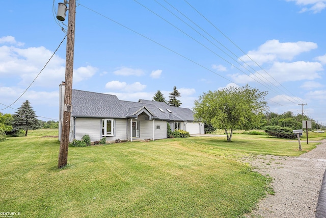 6920 Snover Rd, Decker, MI 48426 - view of front facade with a garage, a front yard, a chimney, and roof with shingles