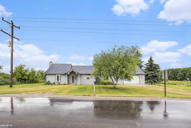 6920 Snover Rd, Decker, MI 48426 - view of front facade featuring a front yard, an attached garage, a chimney, and a shingled roof