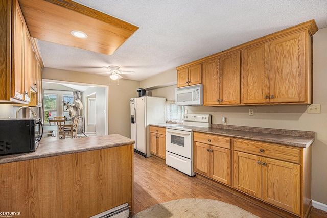 6920 Snover Rd, Decker, MI 48426 - kitchen featuring white appliances, light wood-style floors, ceiling fan, a textured ceiling, and dark countertops