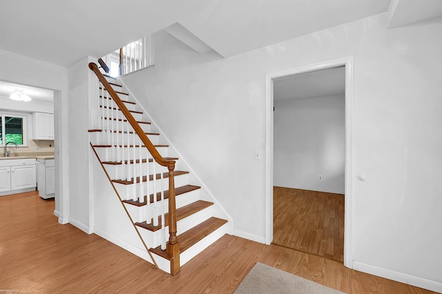 19300 Briarwood St, Clinton Township, MI 48036 - staircase with wood finished floors and baseboards