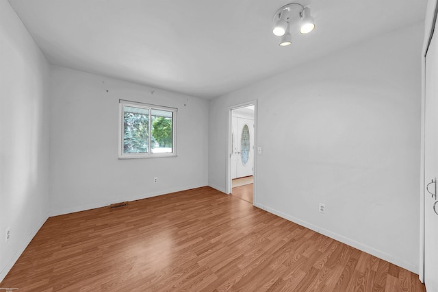19300 Briarwood St, Clinton Township, MI 48036 - unfurnished room featuring light wood-style floors and baseboards