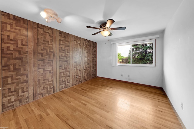 19300 Briarwood St, Clinton Township, MI 48036 - unfurnished room with a ceiling fan and wood finished floors