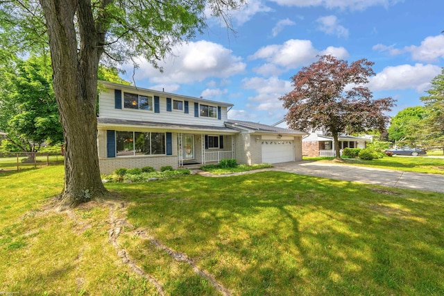 19300 Briarwood St, Clinton Township, MI 48036 - traditional home with an attached garage, brick siding, and driveway