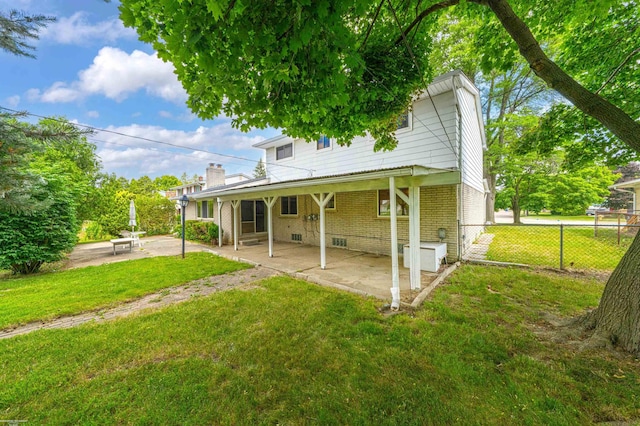 19300 Briarwood St, Clinton Township, MI 48036 - back of house with brick siding and a patio area