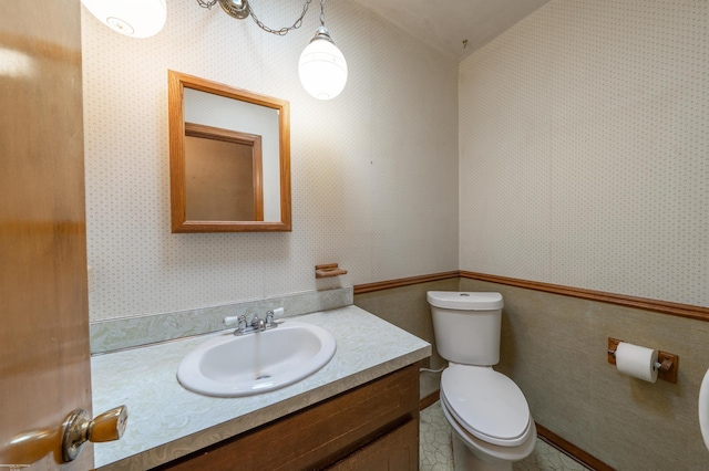 19300 Briarwood St, Clinton Township, MI 48036 - bathroom with wallpapered walls and vanity