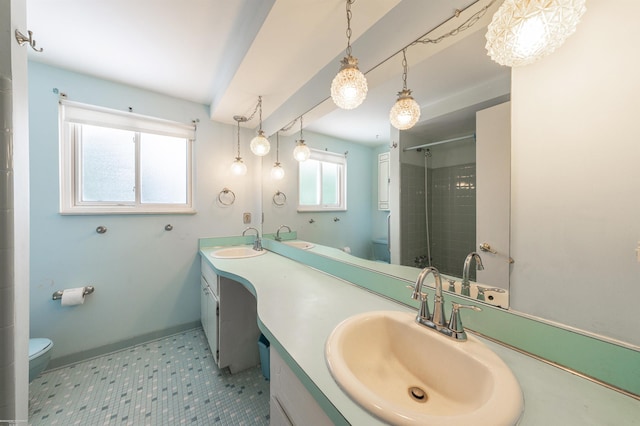 19300 Briarwood St, Clinton Township, MI 48036 - bathroom with double vanity, a shower with door, and tile patterned floors