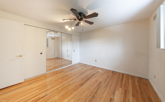 19300 Briarwood St, Clinton Township, MI 48036 - unfurnished bedroom with wood finished floors, a closet, and ceiling fan
