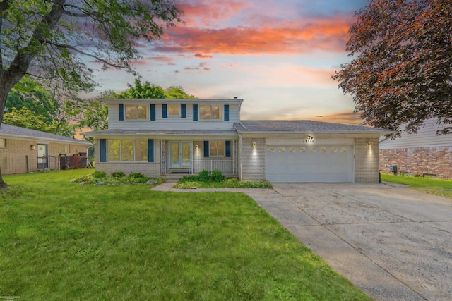 19300 Briarwood St, Clinton Township, MI 48036 - traditional home featuring an attached garage, driveway, brick siding, and a porch