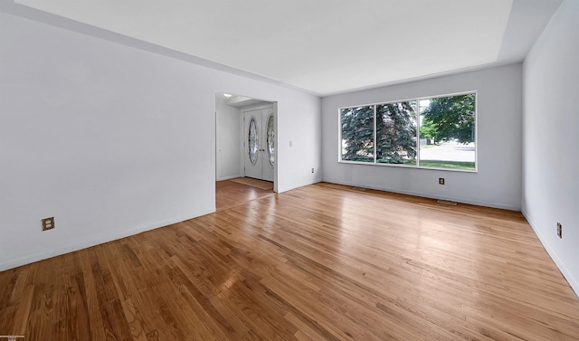 19300 Briarwood St, Clinton Township, MI 48036 - empty room with wood finished floors and baseboards