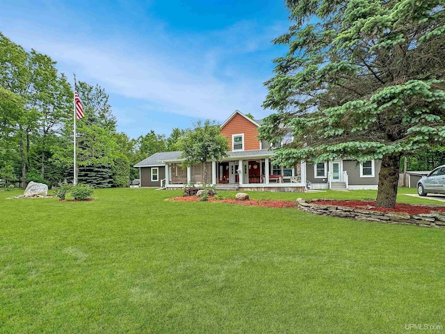 8302 W Burntwood P.15 Dr, Gladstone, MI 49837 - view of front of home featuring covered porch and a front lawn
