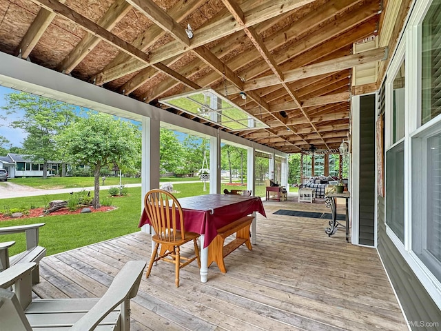 8302 W Burntwood P.15 Dr, Gladstone, MI 49837 - deck with outdoor dining area and a yard