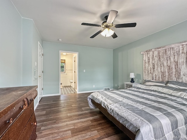 8302 W Burntwood P.15 Dr, Gladstone, MI 49837 - bedroom featuring wood finished floors, ceiling fan, and ensuite bath