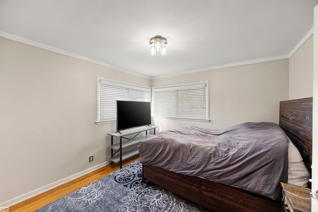 1006 W 12 Mile Rd, Royal Oak, MI 48073 - bedroom featuring crown molding and wood finished floors