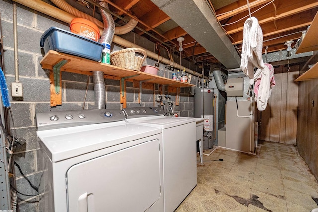 5350 Fieldcrest Dr, Shelby Twp, MI 48316 - laundry area featuring water heater, washing machine and clothes dryer, and heating unit